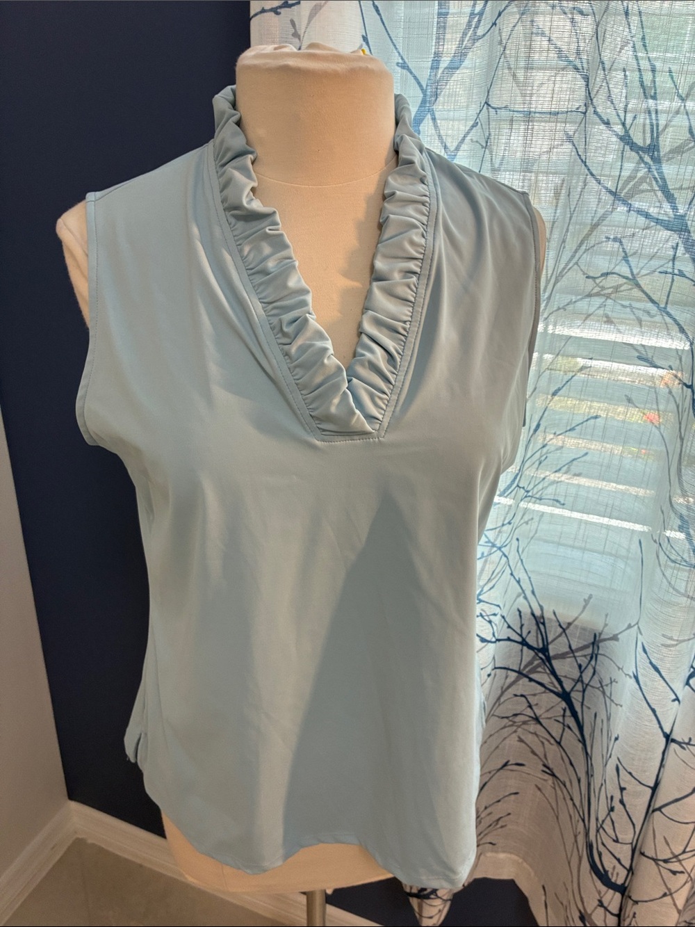 Acegolfs Sleeveless Ruffle V-Neck Top - Light Blue